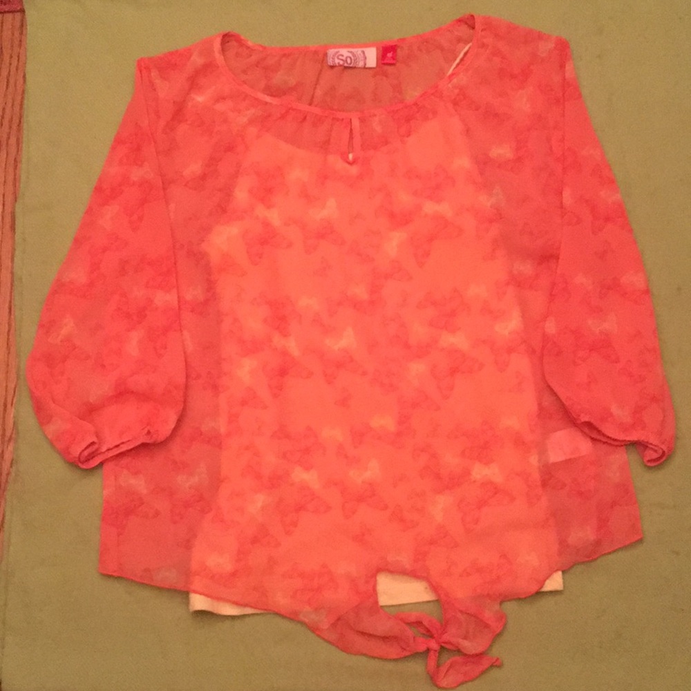 Orange butterfly shirt with yellow cami underneath